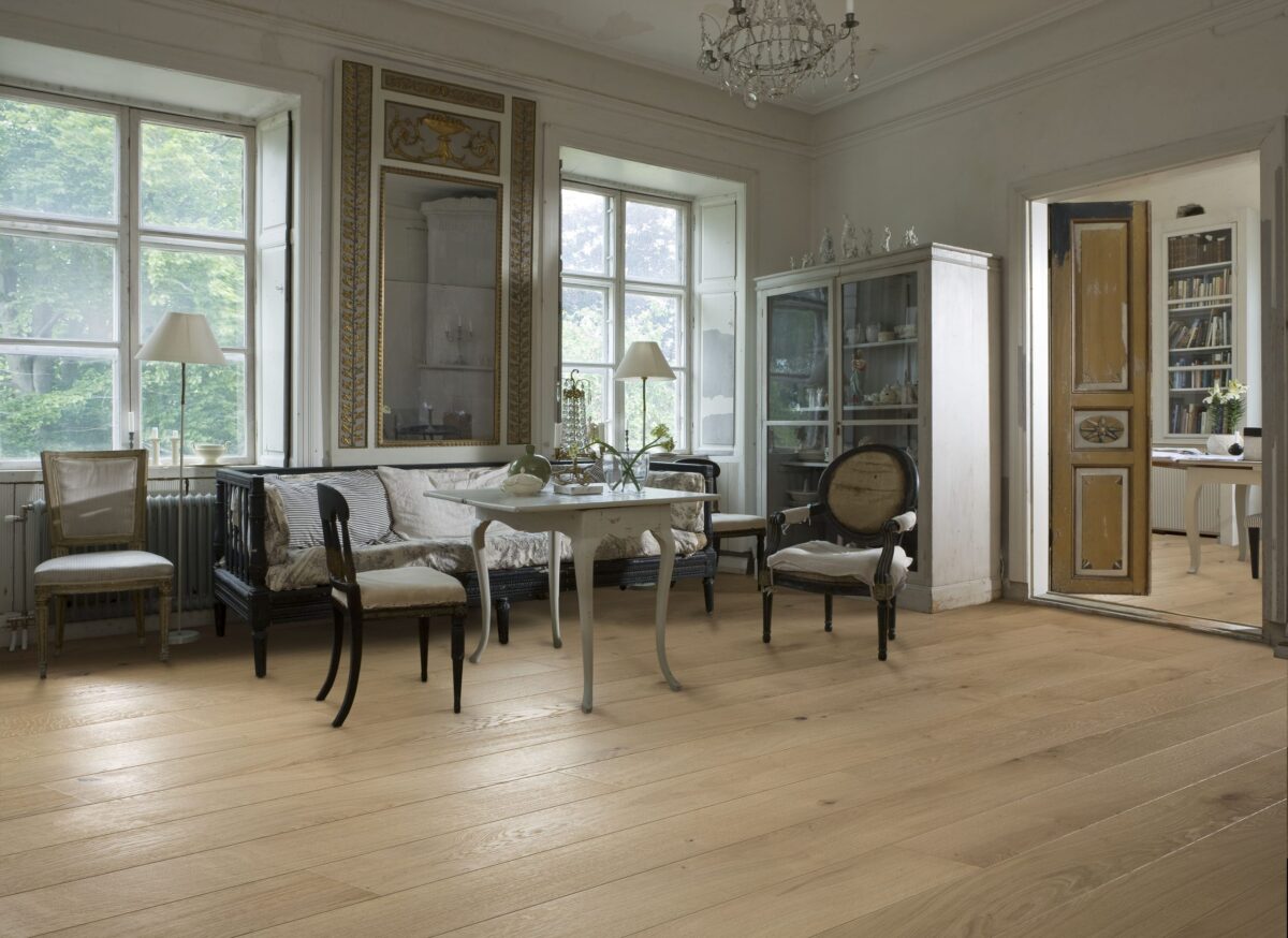 Decorated indoor space with Kahrs Oak Nouveau White Prefinished Hardwood.