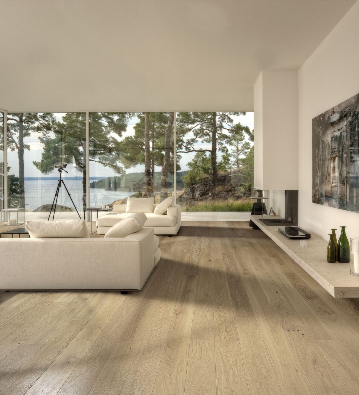 Decorated indoor room with natural lighting and Kahrs Oak Nouveau White Prefinished Hardwood.