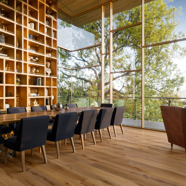 Decorated indoor room with natural lighting and Appalachian Cotton White Oak Live Sawn Character Prefinished Hardwood.