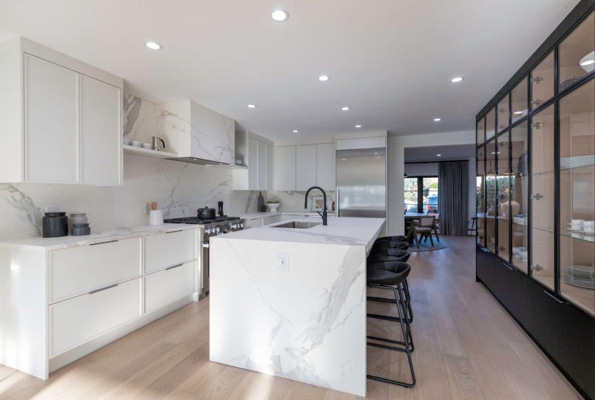 Decorated kitchen space with DuChateau White Patina Vernal Prefinished Hardwood.