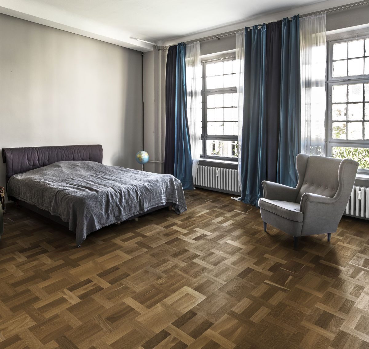 Decorated bedroom space with Kahrs Oak Palazzo Fumo Prefinished Hardwood.