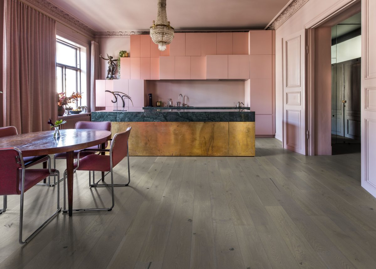 Decorated kitchen space with Kahrs Pearl Grey Plank Prefinished Hardwood.