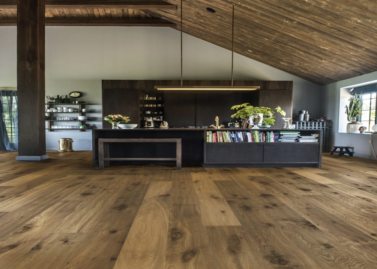 Decorated kitchen space with Kahrs Sevede Prefinished Hardwood.