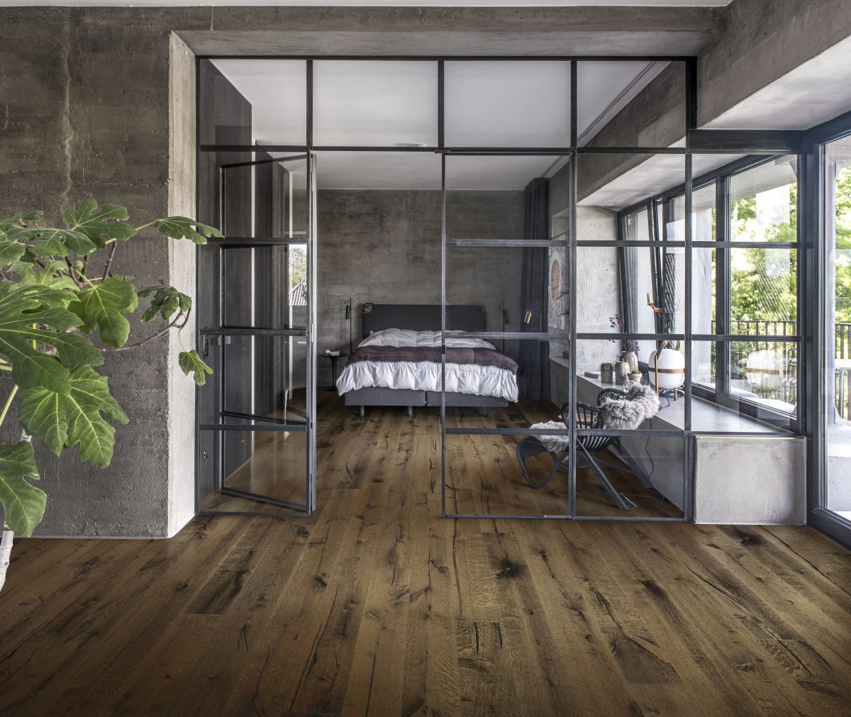 Decorated bedroom space with Kahrs Tveta Prefinished Hardwood.