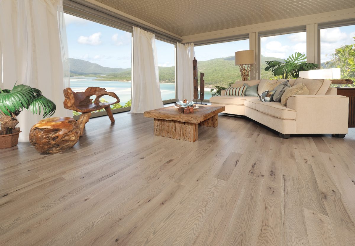 Decorated living room with Mirage Red Oak Chateau Character Brushed Prefinished Hardwood.