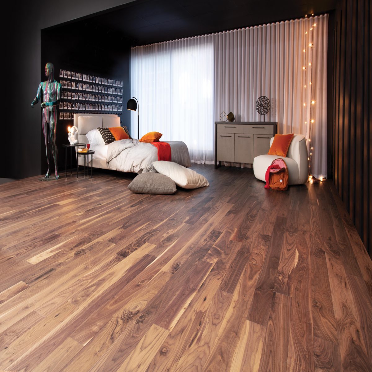 Decorated bedroom space with Mirage Walnut Natural Character Brushed Prefinished Hardwood.