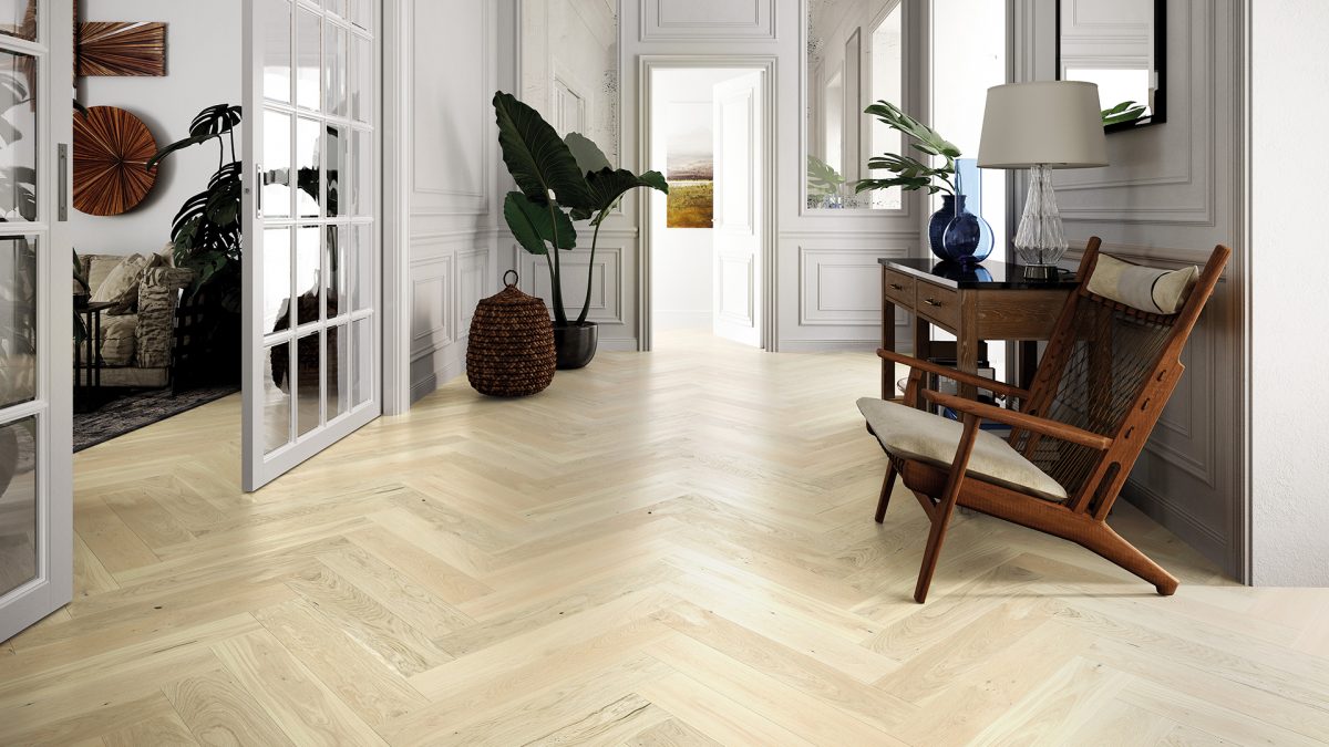 Decorated indoor space with Barlinek Oak Bianco Herringbone Prefinished Hardwood.