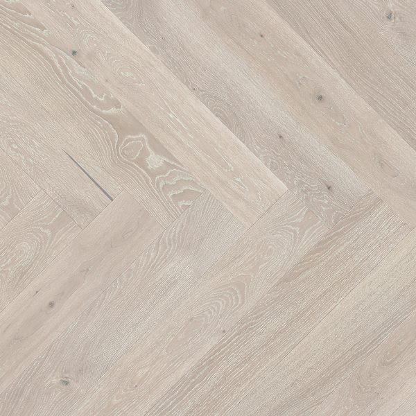 Close up of Barlinek Oak Pudding Herringbone Prefinished Hardwood.