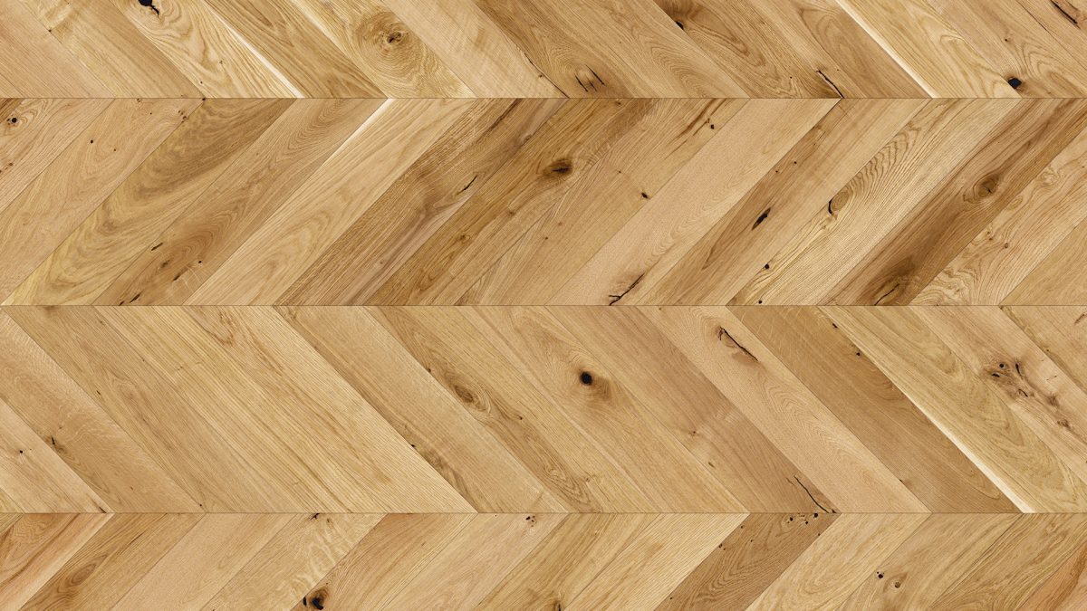 Close up of Barlinek Oak Raisins Chevron Prefinished Hardwood.