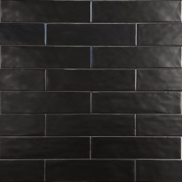 Close up of Equipe Cottage Black Matt Tiles And Stone.