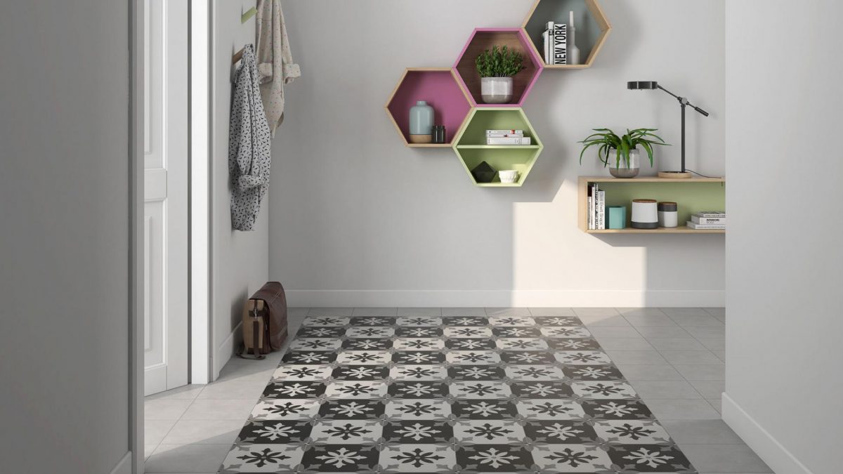 Decorated doorway with Pamesa Art Degas Blanco And Negro Tiles And Stone.