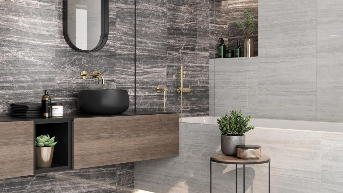 Decorated bathroom space with Pamesa Badab Neutro Pulido And Noir Pulido Tiles And Stone.