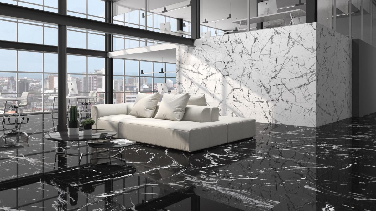 Decorated indoor room with natural lighting and Pamesa Lux Iceberg White And Iliria Nero Tiles And Stone.