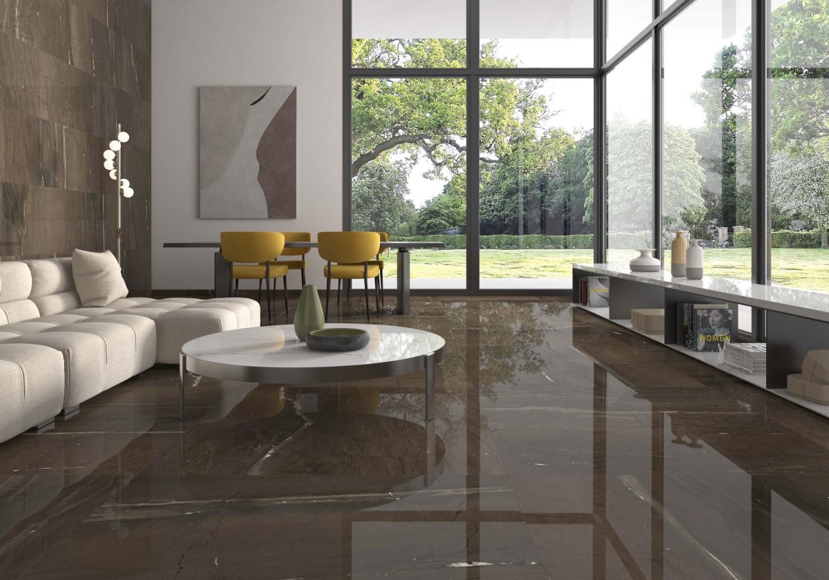 Decorated indoor room with natural lighting and Pamesa XXL Jatoba Brown Pulido Tiles And Stone.