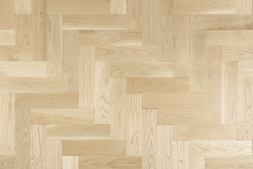 Close up of White Oak Herringbone Solid Unfinished Hardwood.