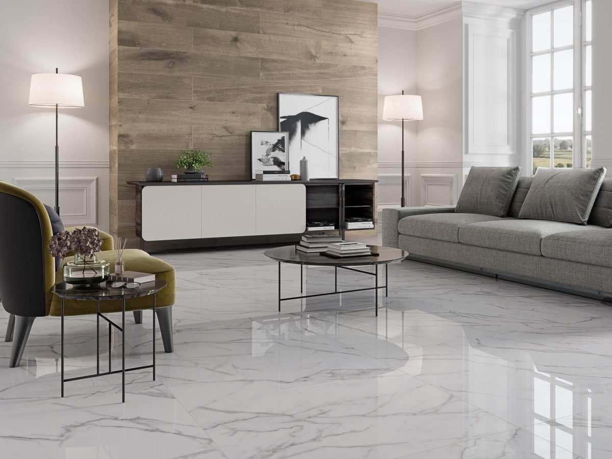 Decorated indoor room with natural lighting and Pamesa Lincoln White Pulido Tiles And Stone.